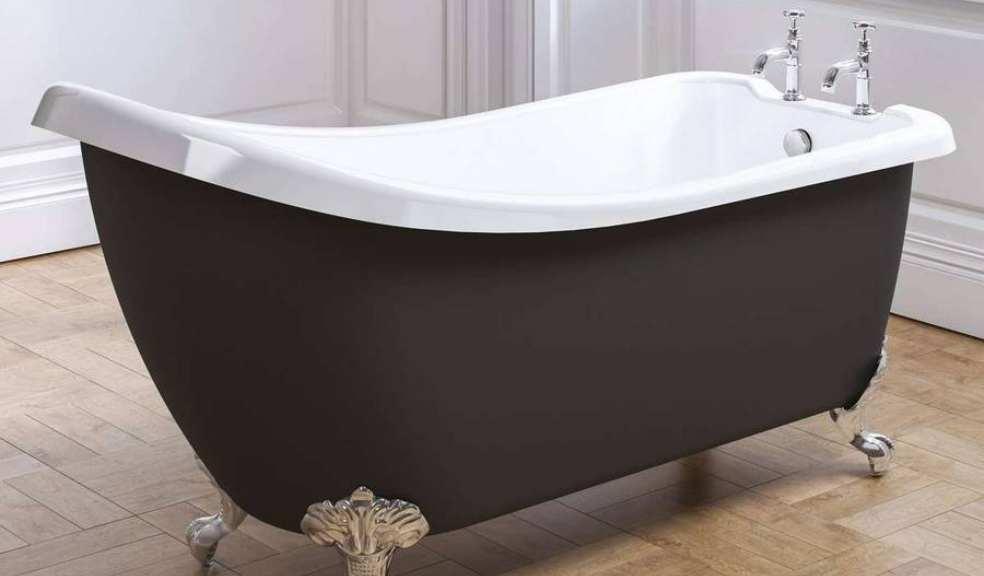 A black traditional style rolltop bath with silver claw feet