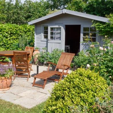 Shed with terrace and garden furniture